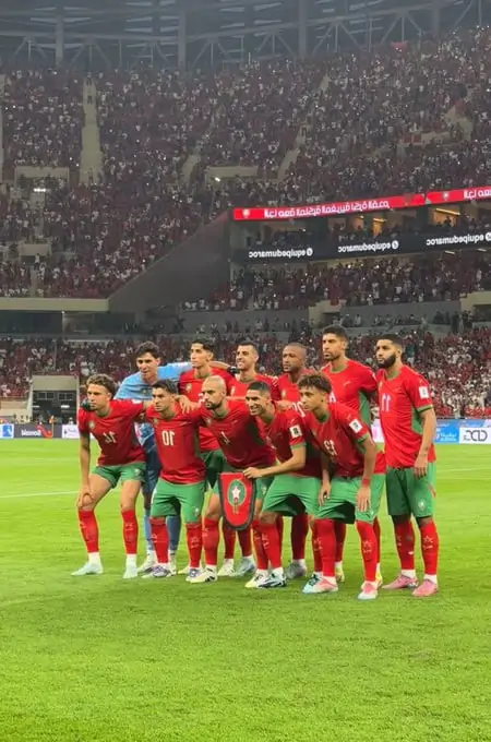 Joueurs marocains célébrant leur victoire contre les États-Unis.